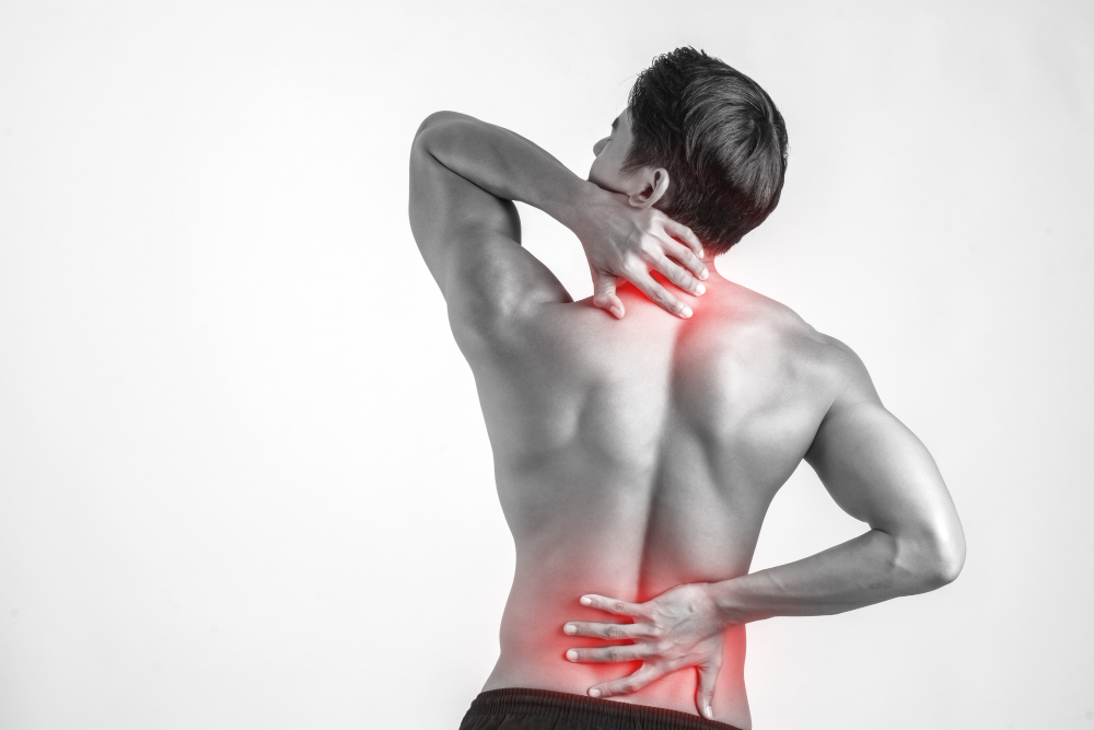 Minimally Invasive Back Pain Treatment for Athletes and Active Individuals Athlete experiencing upper and lower back pain highlighting the need for minimally invasive back pain treatment for active individuals